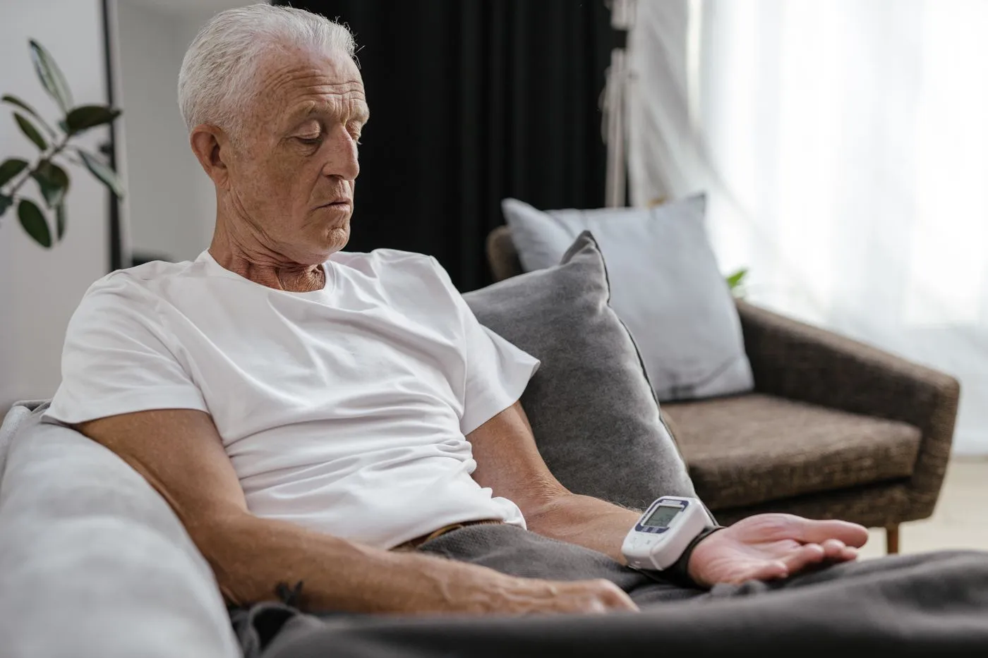 CardioC2 Reviews: Does This Heart & Circulation Complex Work? 2 Older man at home checking his blood pressure with a monitor