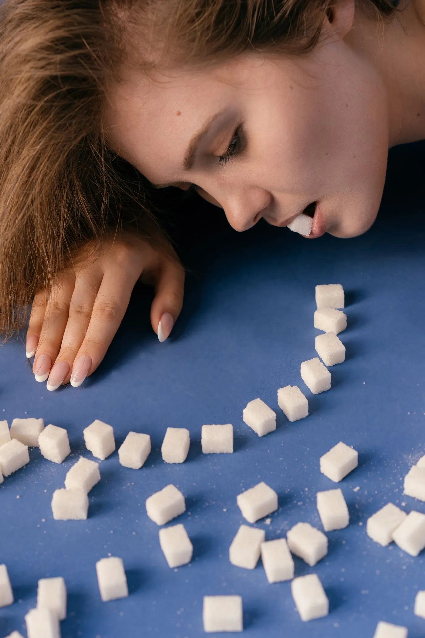 GlucoTrust Reviews: Does This Blood Sugar Supplement Work? 2 Woman struggling with sugar cravings and blood sugar worries