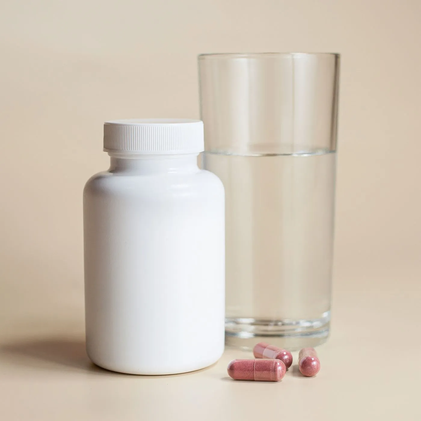 iGenics Reviews: Does This Eye Supplement Work? 5 Taking a daily eye health capsule with a glass of water