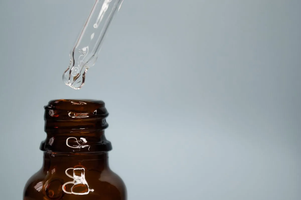 MindQuell Reviews: Do These Brain Support Drops Work? 5 Taking MindQuell brain support drops with a dropper